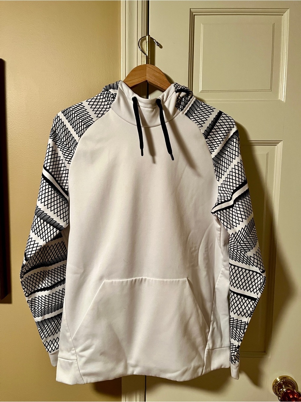 Nike White Hoodie with Black Patterned Raglan Sleeves